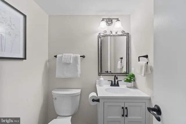 a bed room with a bed and a television