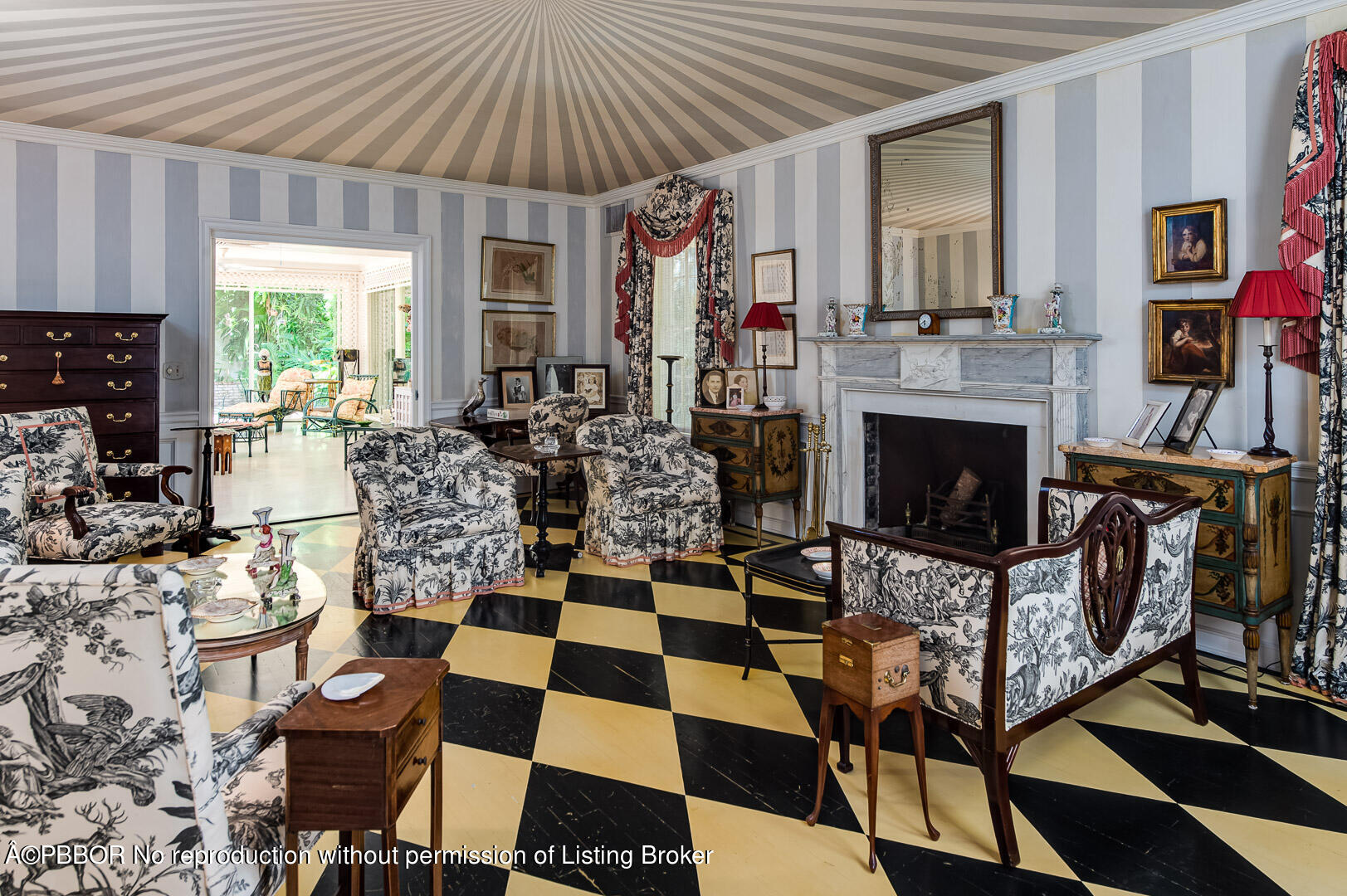 345 Pendleton Lane Palm Beach, FL 33480 - Photo 6 of 11 a living room with furniture a fireplace and a flat screen tv