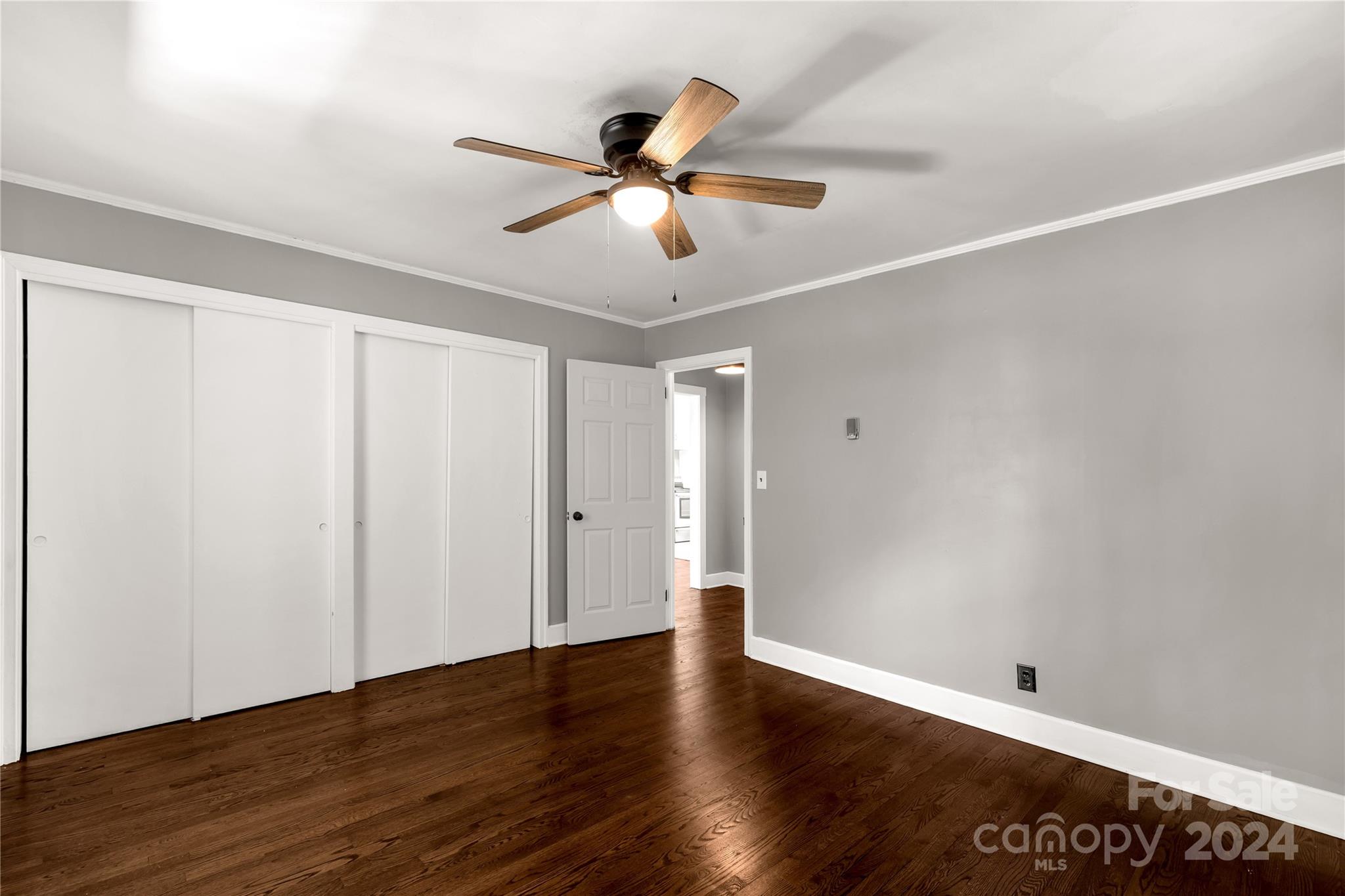 303 North White Street Lancaster, SC 29720 - Photo 11 of 24 a view of an empty room with wooden floor