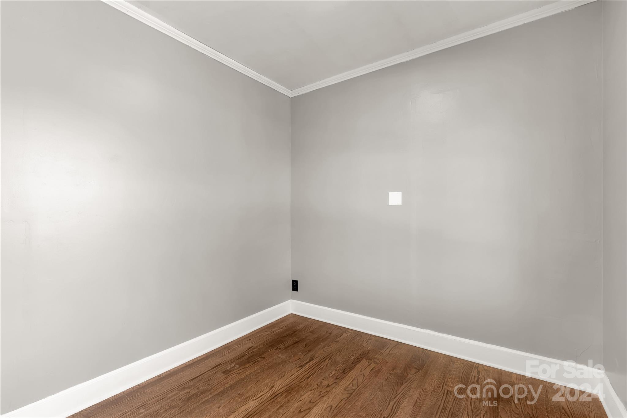 303 North White Street Lancaster, SC 29720 - Photo 17 of 24 a view of an empty room with wooden floor