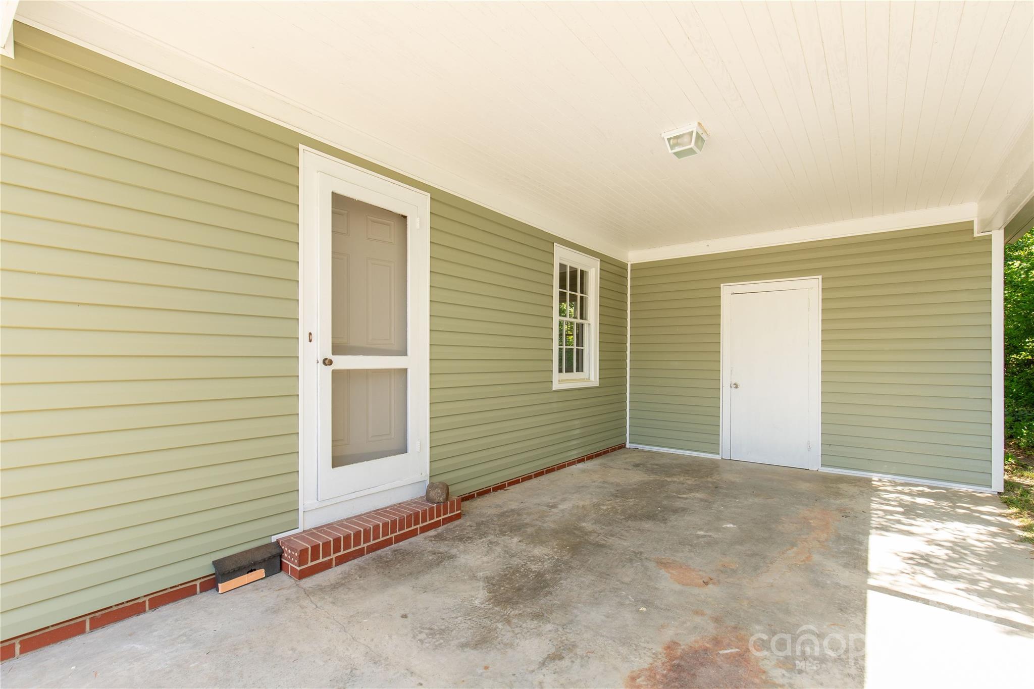 303 North White Street Lancaster, SC 29720 - Photo 19 of 24 a view of a house with a garage