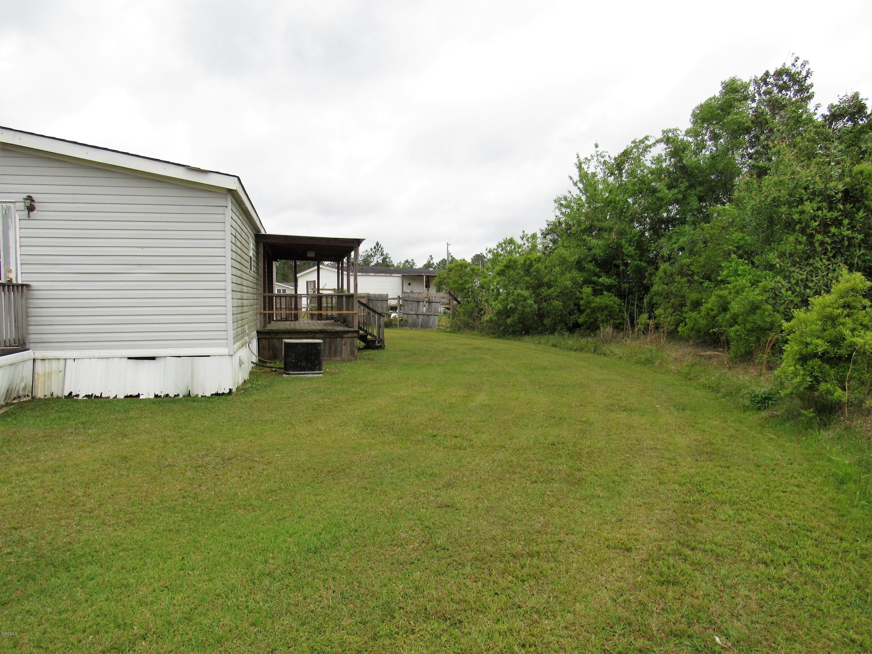20066 Charred Road Saucier, MS 39574 - Photo 16 of 18 BACKYARD VIEW 1