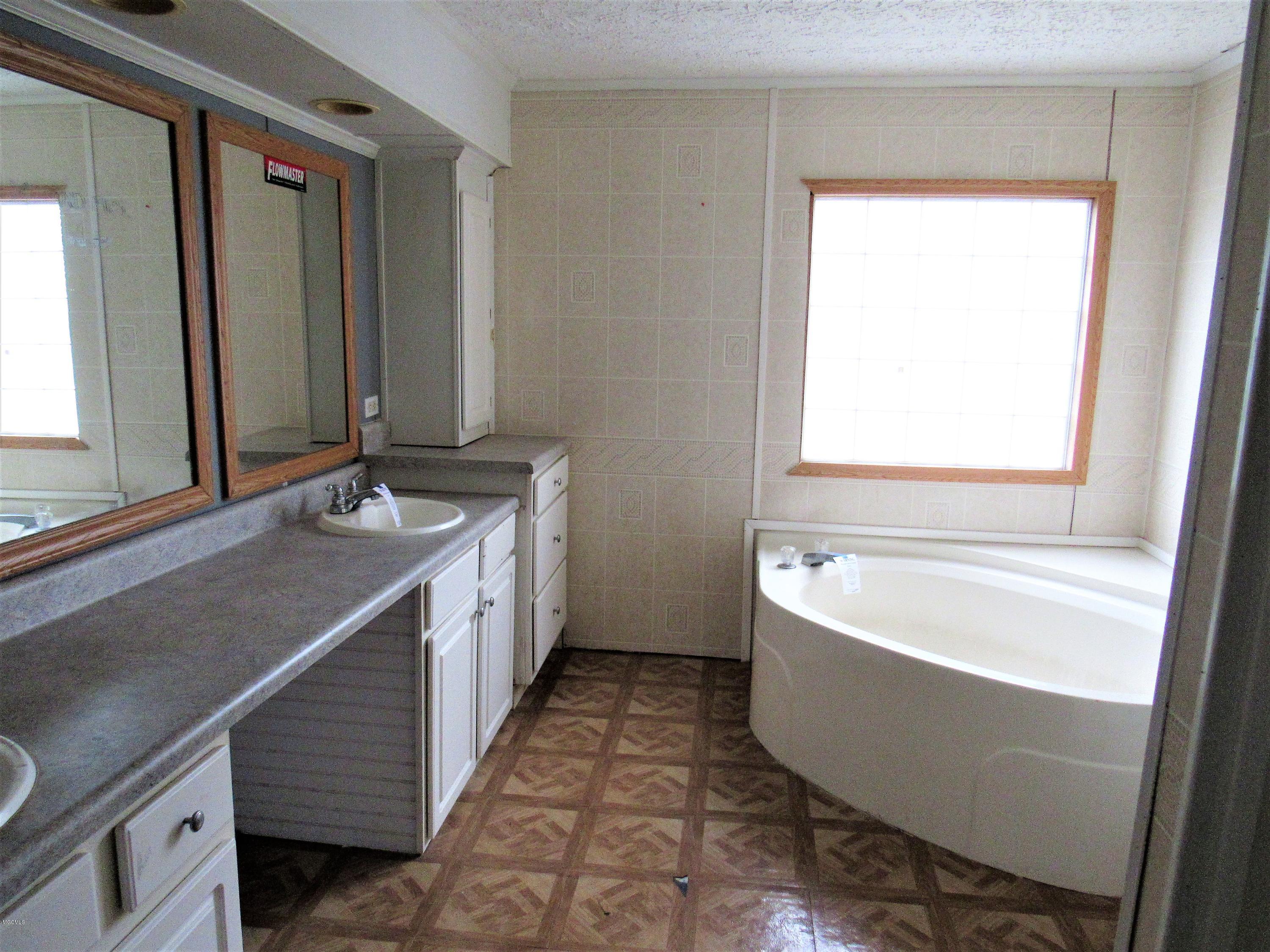 20066 Charred Road Saucier, MS 39574 - Photo 9 of 18 MASTER BATHROOM VIEW 1