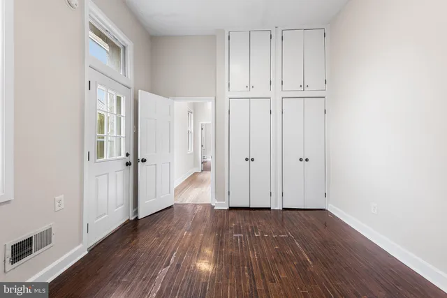 a view of a balcony with furniture and the stairs