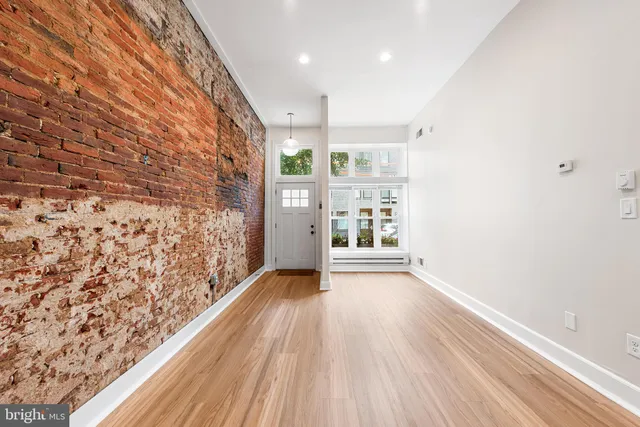 a view of livingroom with wooden floor