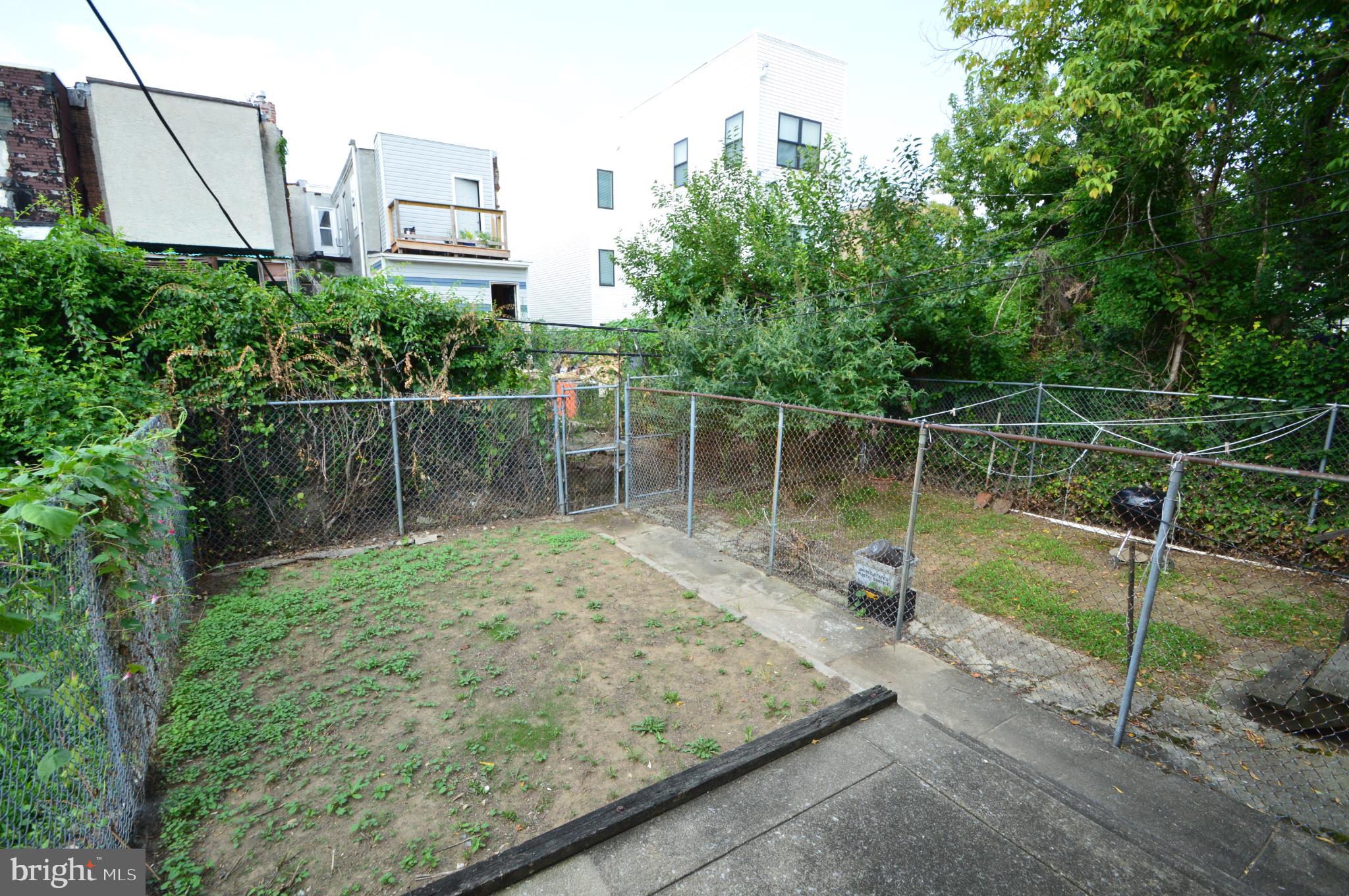 6011 Sansom Street Philadelphia, PA 19139 - Photo 21 of 24 a view of a lake with a large trees