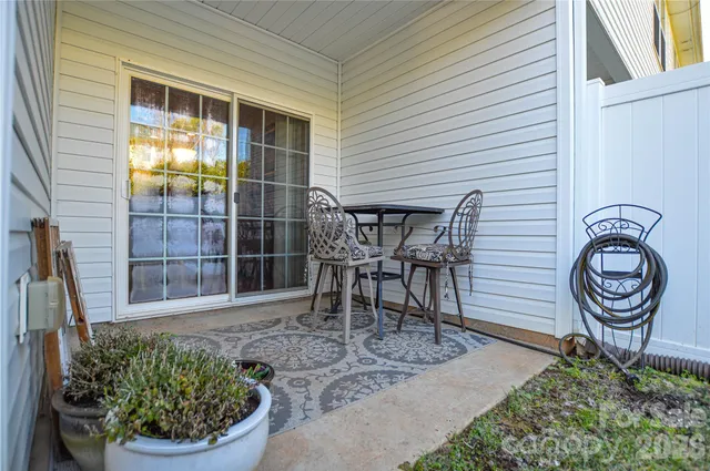 a view of a chairs in front of house