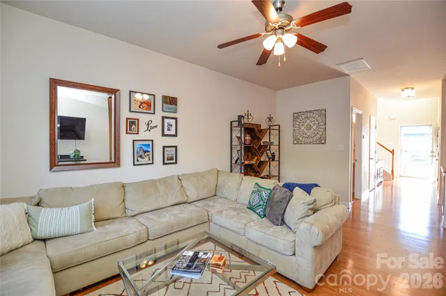a living room with furniture and a couch