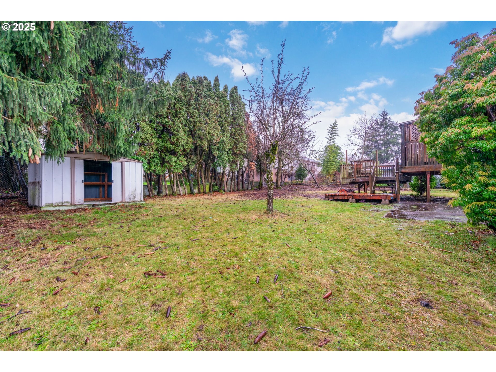 13122 Northeast Morris Court Portland, OR 97230 - Photo 35 of 38 a backyard of a house with lots of green space
