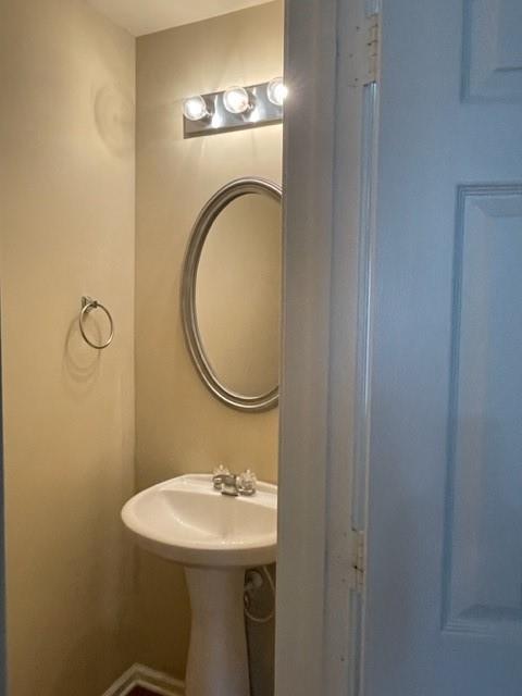 708 Crestwell Circle Atlanta, GA 30331 - Photo 11 of 23 a bathroom with a sink mirror and toilet