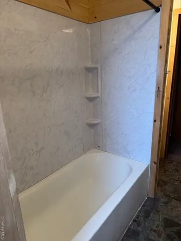 a bathroom with a bathtub