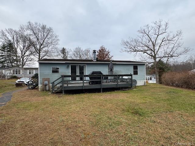 54 Ponderosa Road Bloomingburg, NY 12721 - Photo 2 of 22 a view of a house with backyard and roof