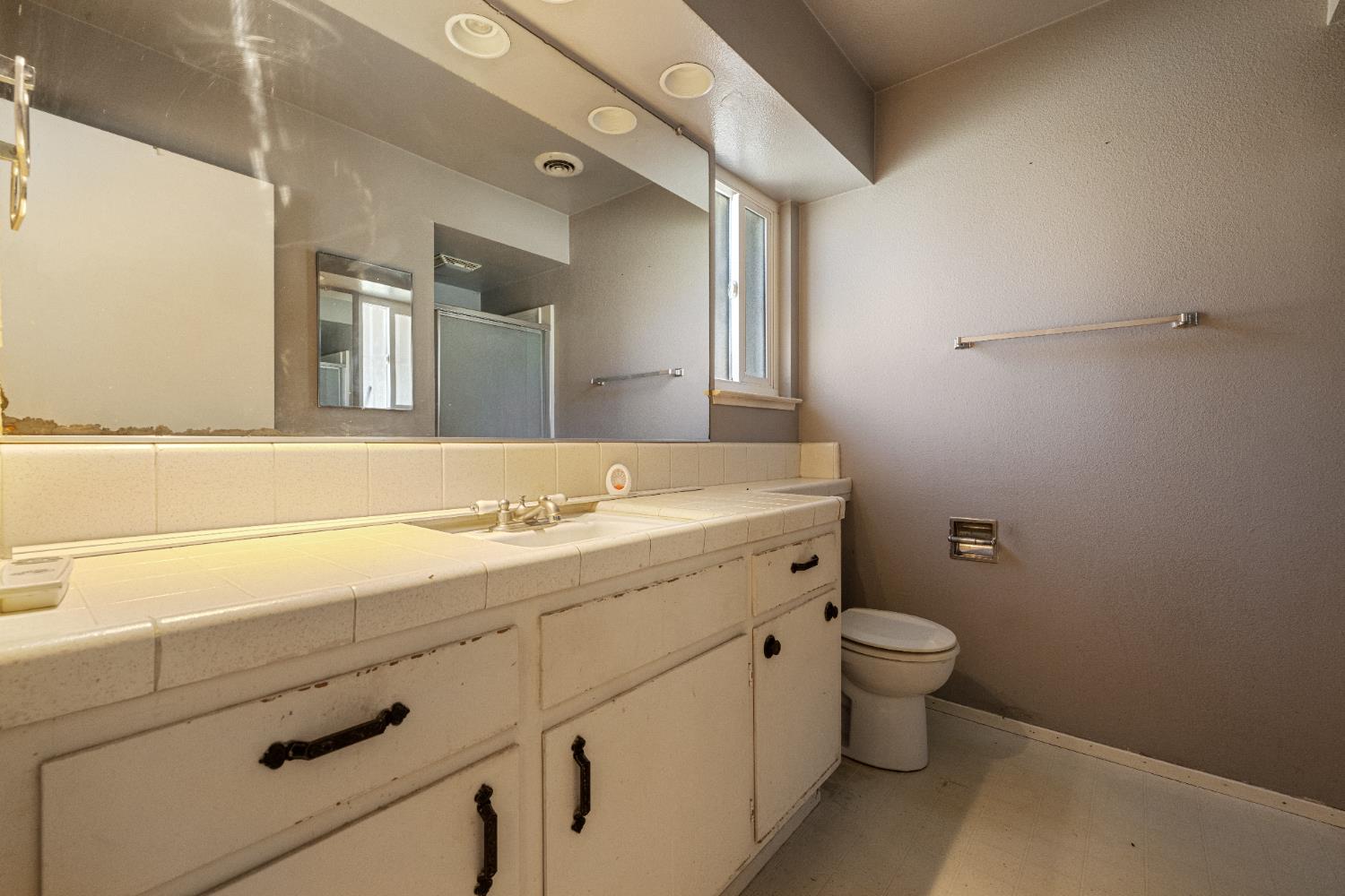 808 Cadillac Drive Modesto, CA 95351 - Photo 15 of 41 Primary Bathroom includes a vanity with large storage areas.