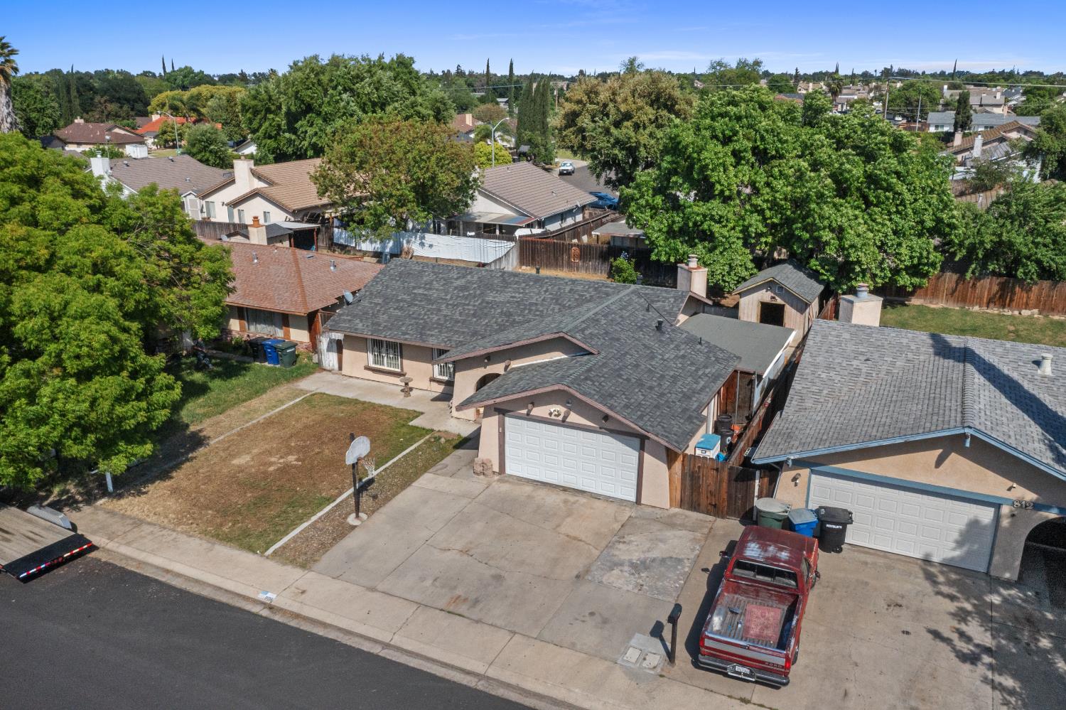 808 Cadillac Drive Modesto, CA 95351 - Photo 38 of 41 aerial perspective of suburban area