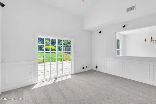a view of a hallway with staircase