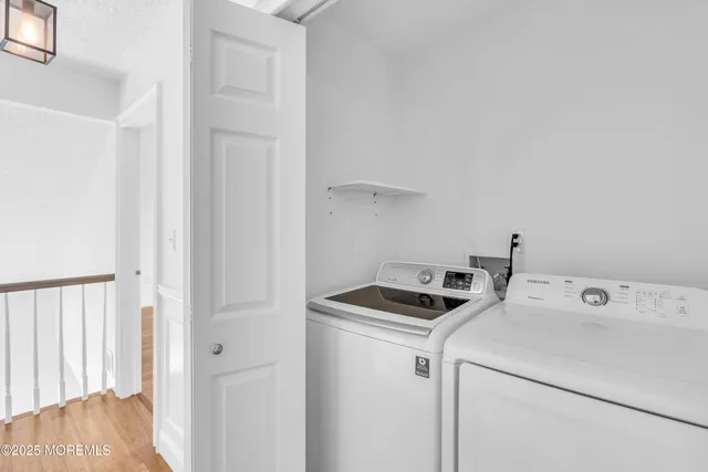 a view of a patio with a table and chairs
