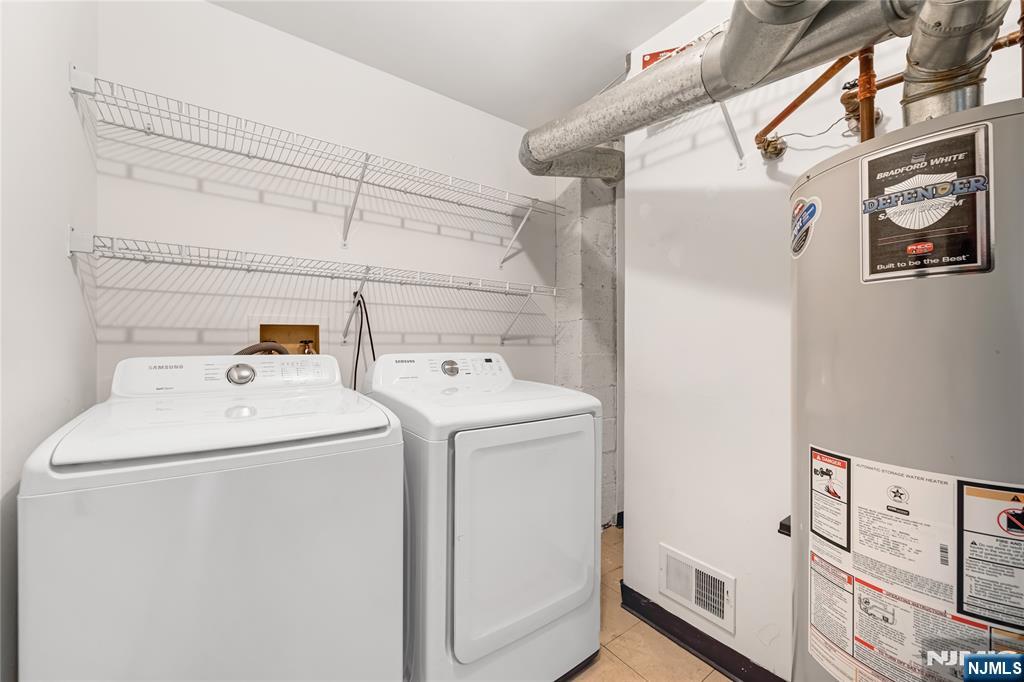 581 Holly Court Mahwah, NJ 07430 - Photo 14 of 21 a utility room with dryer and washer