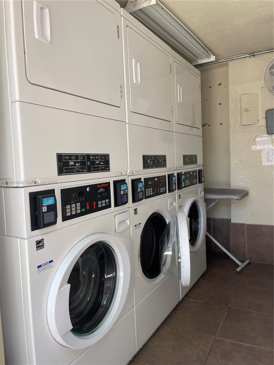 1405 Miami Road, Unit 23 Fort Lauderdale, FL 33316 - Photo 16 of 20 a utility room with dryer and washer