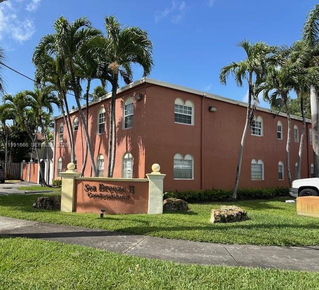 1405 Miami Road, Unit 23 Fort Lauderdale, FL 33316 - Photo 17 of 20 a sign on the side of a building