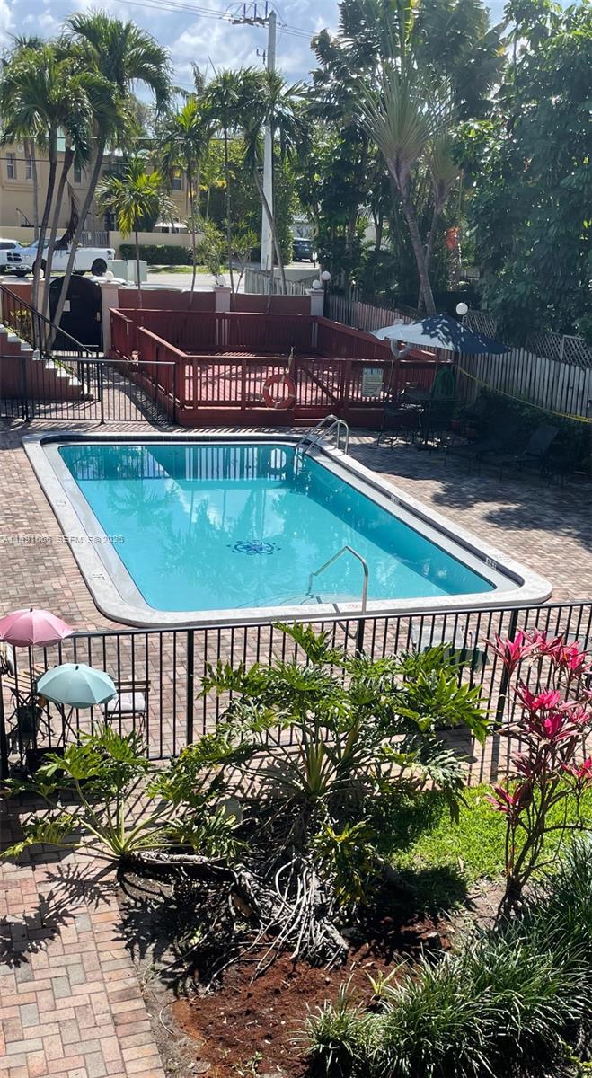 1405 Miami Road, Unit 23 Fort Lauderdale, FL 33316 - Photo 20 of 20 a view of swimming pool with a patio