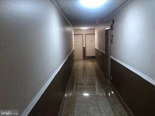 1836 Metzerott Road, Unit 1224 Hyattsville, MD 20783 - Photo 13 of 17 a view of a hallway