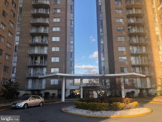 1836 Metzerott Road, Unit 1224 Hyattsville, MD 20783 - Photo 14 of 17 a car parked in front of a building