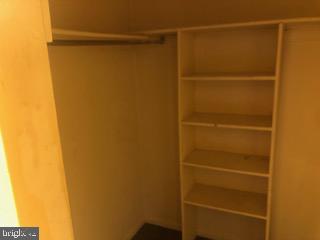1836 Metzerott Road, Unit 1224 Hyattsville, MD 20783 - Photo 9 of 17 a view of a room with empty racks