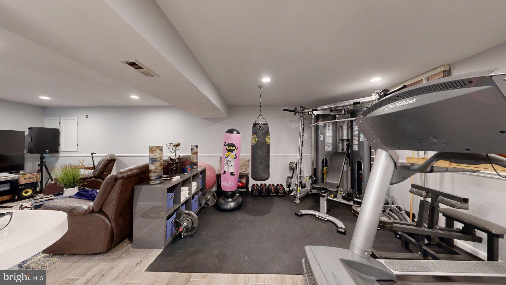 11901 Rustic Farm Court Germantown, MD 20874 - Photo 96 of 134 Versatile basement fitness haven.