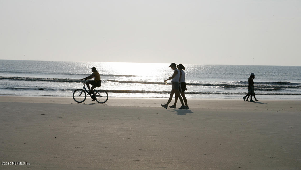 316 Crescent Key Drive St. Augustine, FL 32086 - Photo 11 of 45 a view of a room with furniture and floor to ceiling window