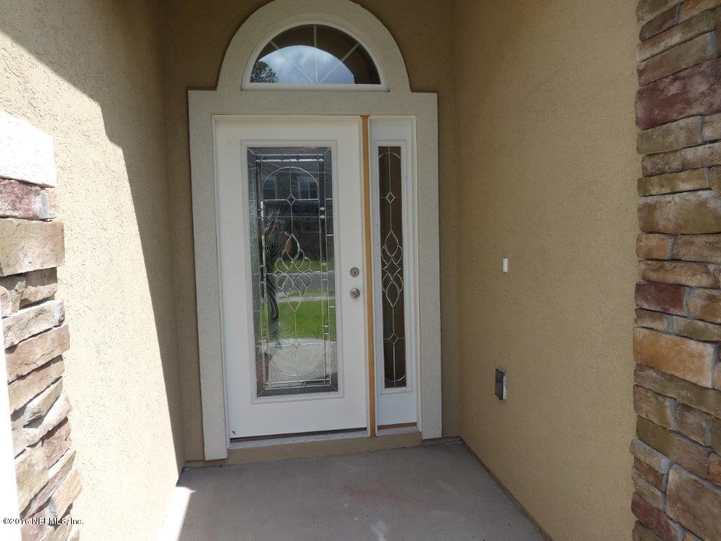 316 Crescent Key Drive St. Augustine, FL 32086 - Photo 15 of 45 a view of a entryway door of the house