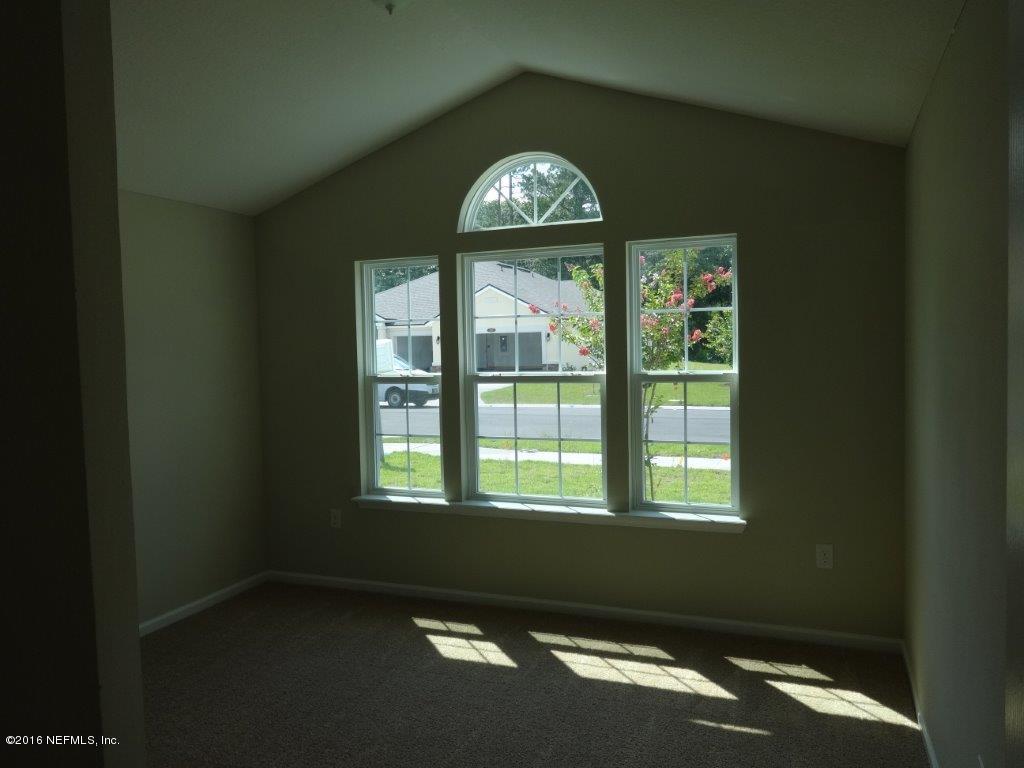 316 Crescent Key Drive St. Augustine, FL 32086 - Photo 24 of 45 an empty room with a window