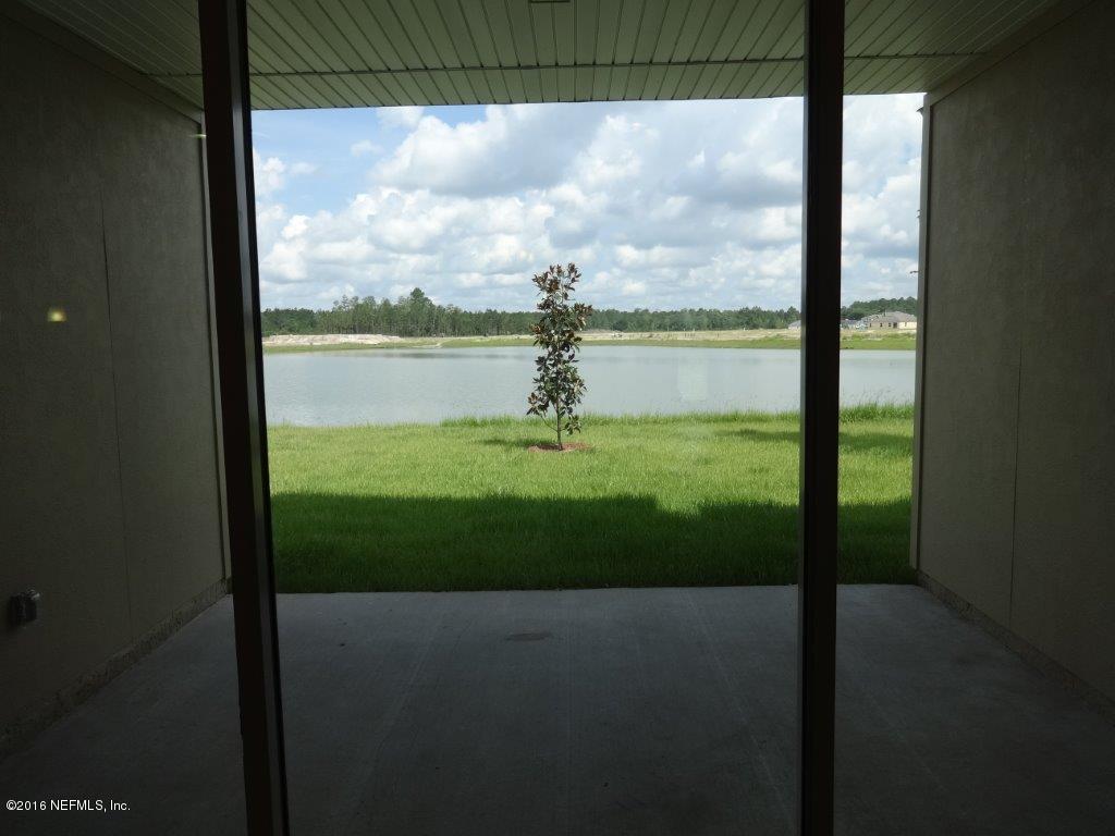 316 Crescent Key Drive St. Augustine, FL 32086 - Photo 27 of 45 a view of a lake from a window