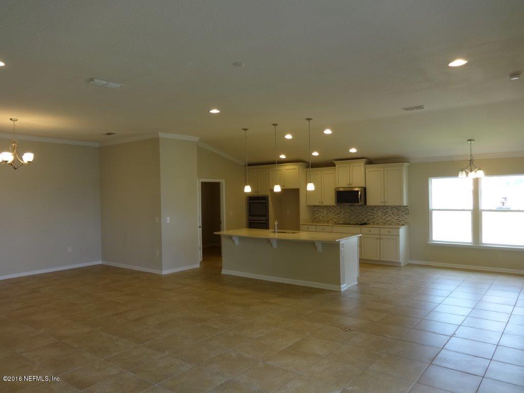 316 Crescent Key Drive St. Augustine, FL 32086 - Photo 28 of 45 a view of a kitchen and a window