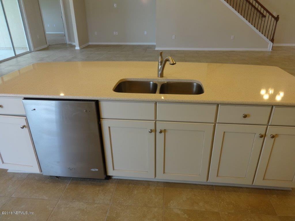 316 Crescent Key Drive St. Augustine, FL 32086 - Photo 36 of 45 a close view of wooden cabinets