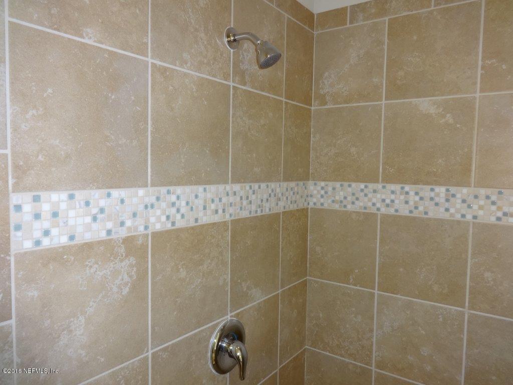 316 Crescent Key Drive St. Augustine, FL 32086 - Photo 39 of 45 a bathroom with a shower