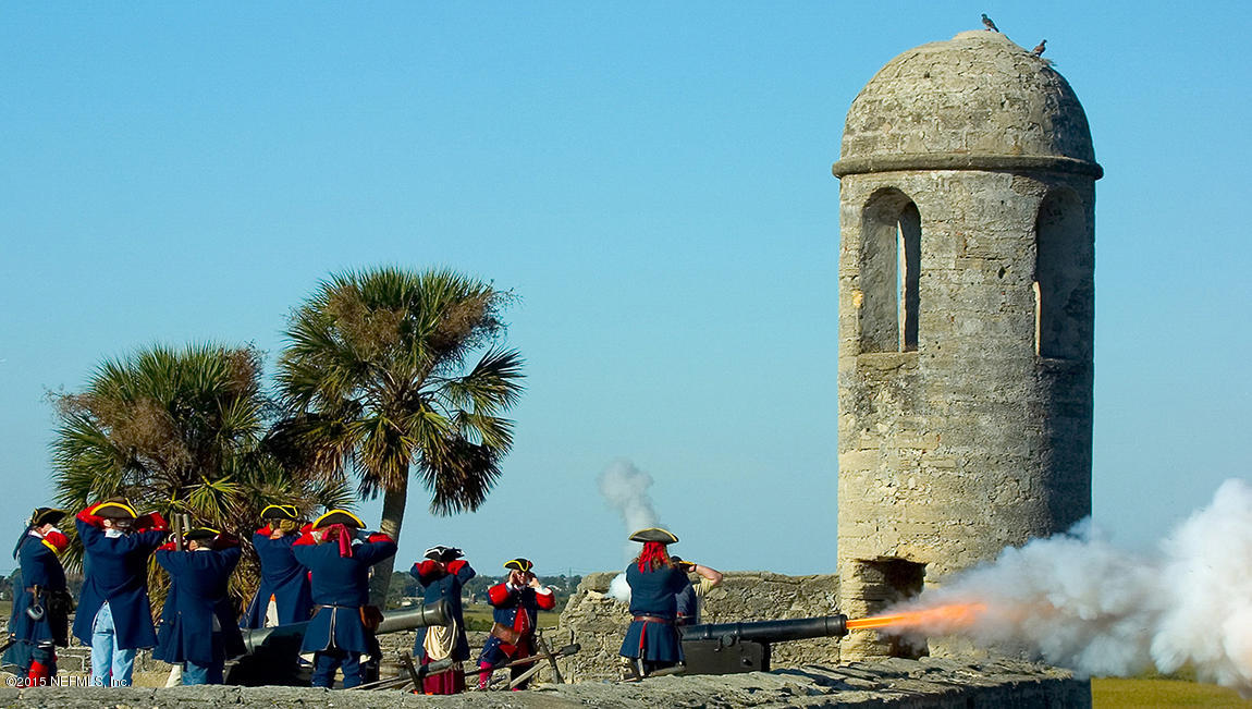316 Crescent Key Drive St. Augustine, FL 32086 - Photo 10 of 45 a front view of a house with a fountain