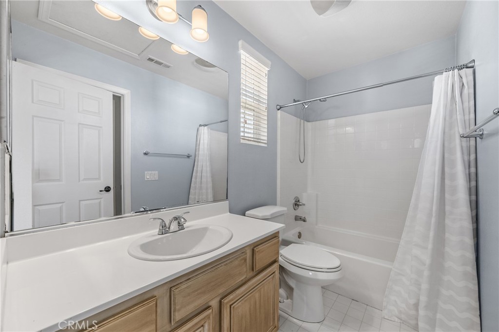 25 Amy Way Ladera Ranch, CA 92694 - Photo 13 of 47 a bathroom with a sink a toilet and shower