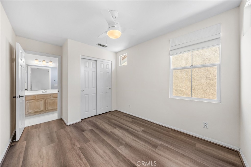 25 Amy Way Ladera Ranch, CA 92694 - Photo 14 of 47 a view of empty room with wooden floor and fan