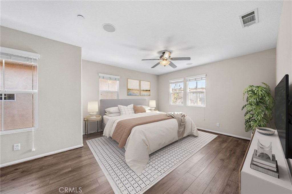 25 Amy Way Ladera Ranch, CA 92694 - Photo 7 of 47 a spacious bedroom with a bed and wooden floor