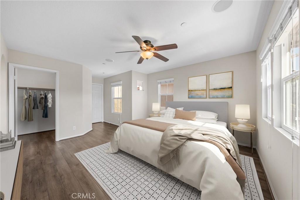 25 Amy Way Ladera Ranch, CA 92694 - Photo 8 of 47 a bed room with a bed and a chandelier