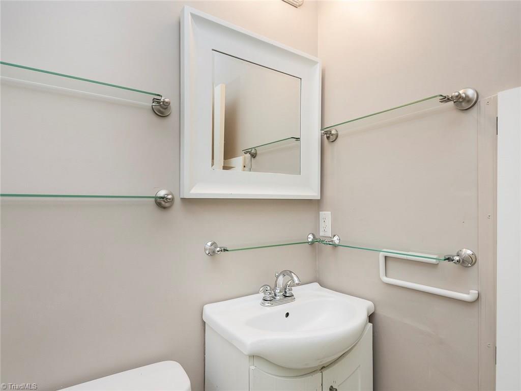 4705 Fewell Road Greensboro, NC 27405 - Photo 11 of 23 The master bath offers single vanity and shower.