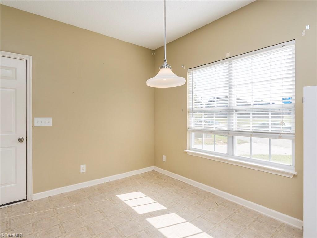 4705 Fewell Road Greensboro, NC 27405 - Photo 6 of 23 The breakfast area offers a great space for a kitchen table!