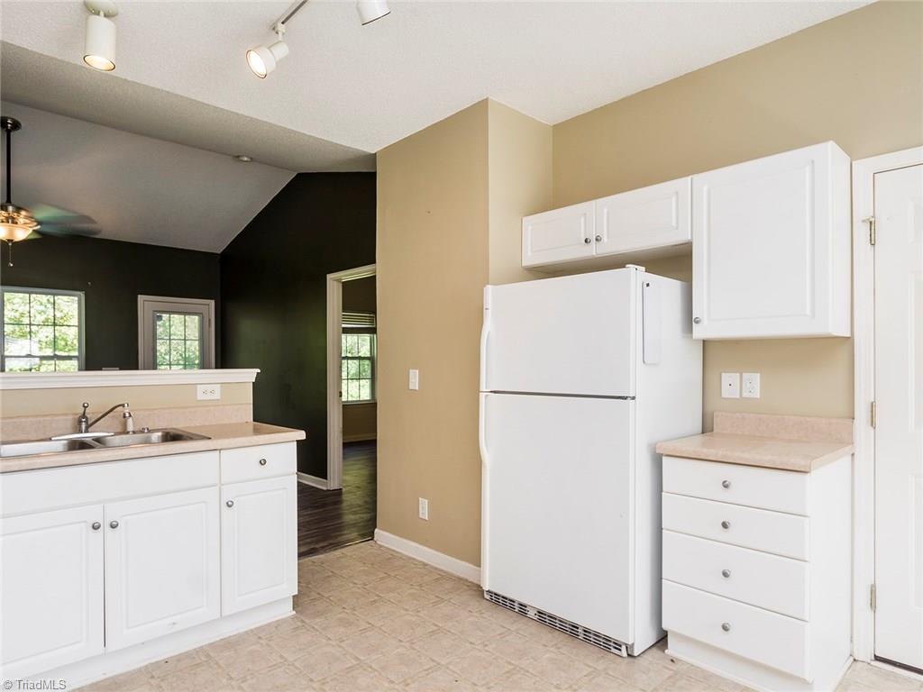 4705 Fewell Road Greensboro, NC 27405 - Photo 7 of 23 The kitchen offers great drawer space and cabinet space!