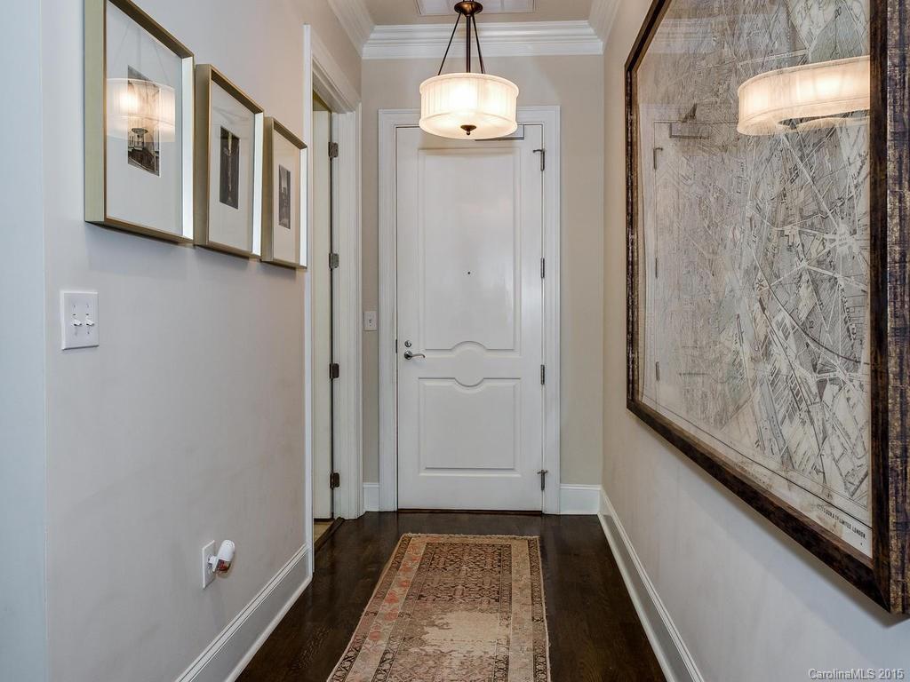 626 Queens Road, Unit 304 Charlotte, NC 28207 - Photo 21 of 24 a view of a entryway door with wooden floor