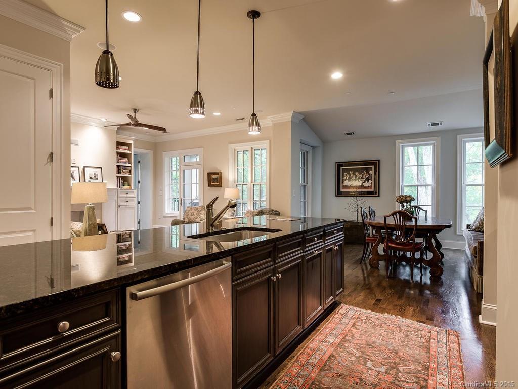 626 Queens Road, Unit 304 Charlotte, NC 28207 - Photo 5 of 24 a kitchen with lots of counter space and a sink