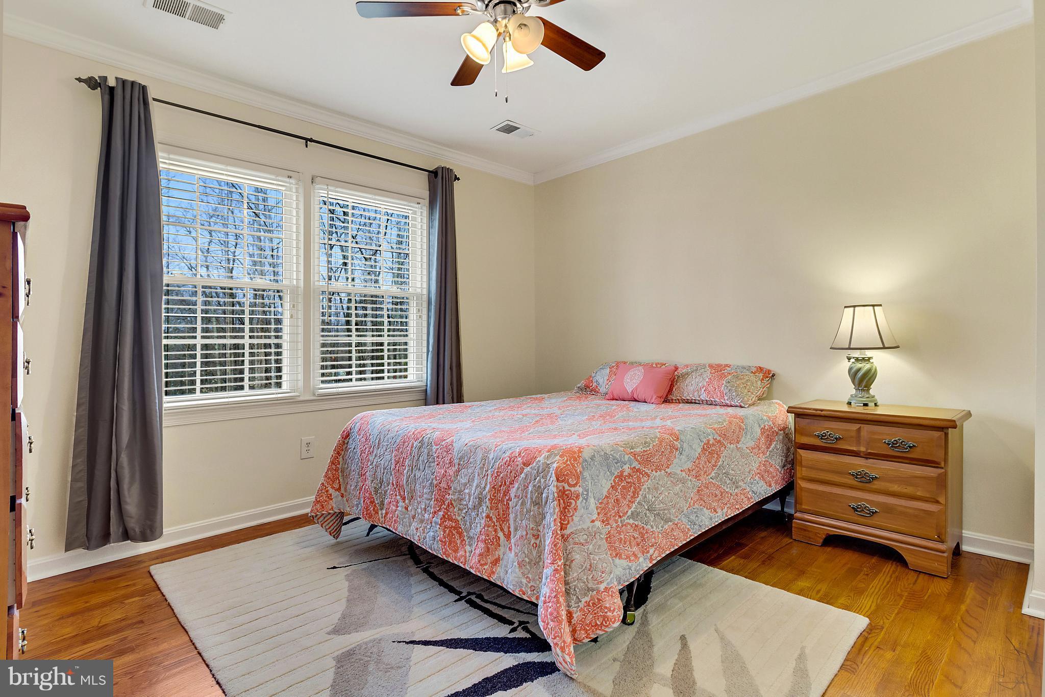 8040 Stillbrooke Road Manassas, VA 20112 - Photo 13 of 29 Bedroom #4 - Wood Flooring, Crown Moulding