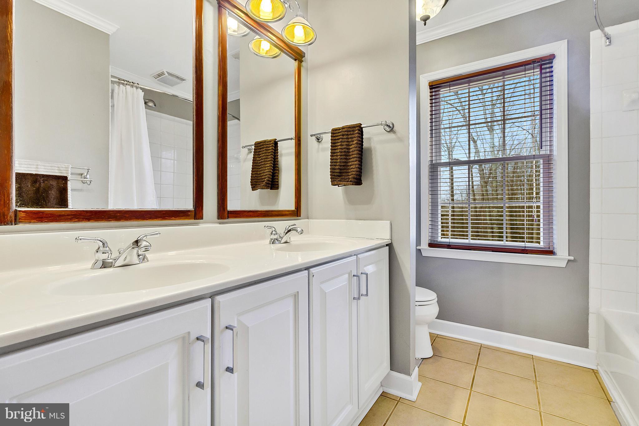 8040 Stillbrooke Road Manassas, VA 20112 - Photo 14 of 29 Upper Level w/Dual Vanity, Shower/Tub, Tile Floor