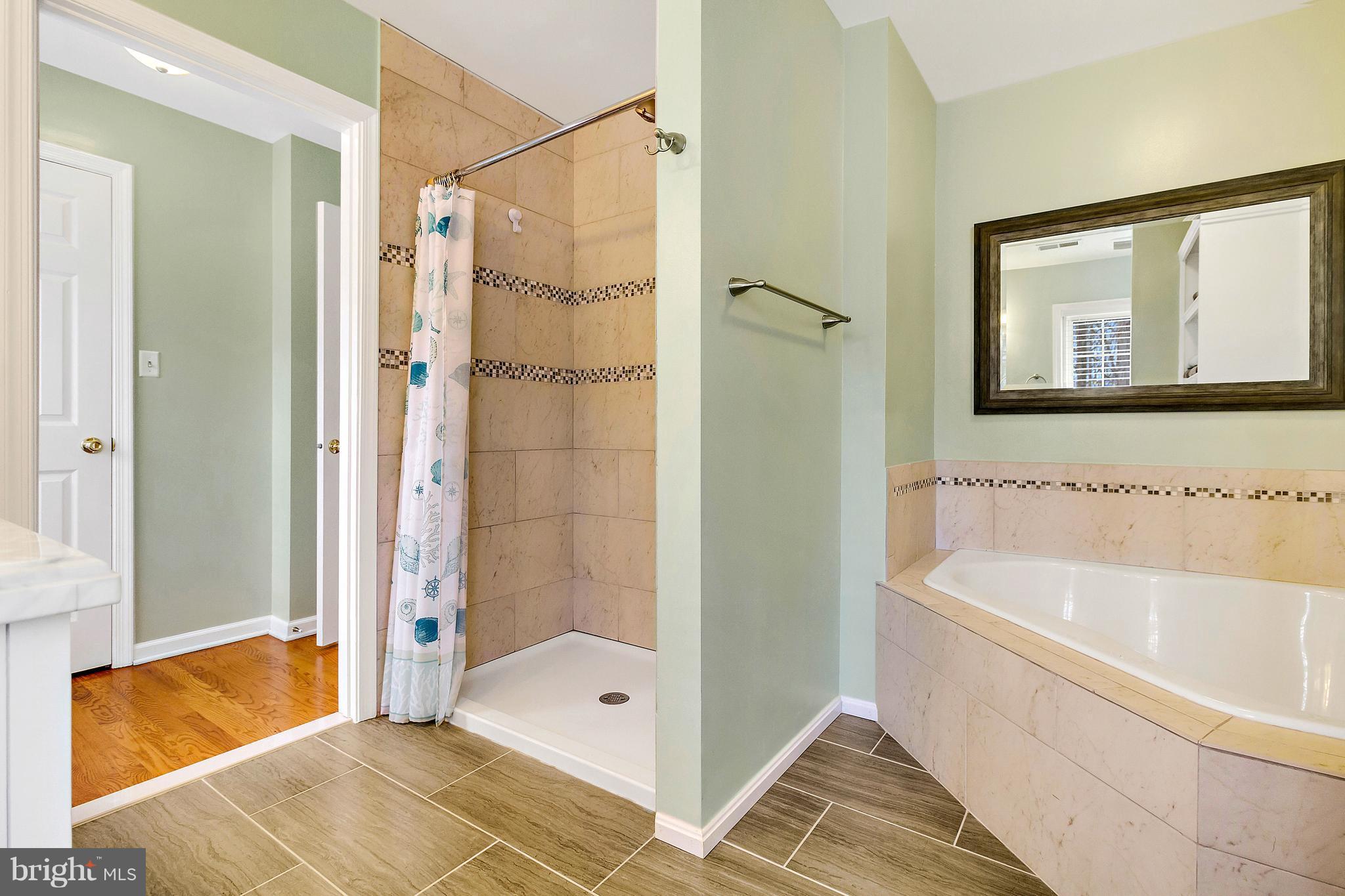 8040 Stillbrooke Road Manassas, VA 20112 - Photo 18 of 29 Renovated w/Tiled Shower and Corner Soaking Tub