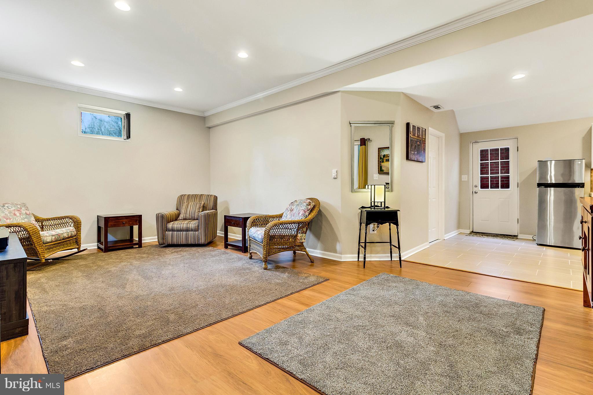 8040 Stillbrooke Road Manassas, VA 20112 - Photo 23 of 29 10' Ceilings, Rec Room w/Wood Laminate