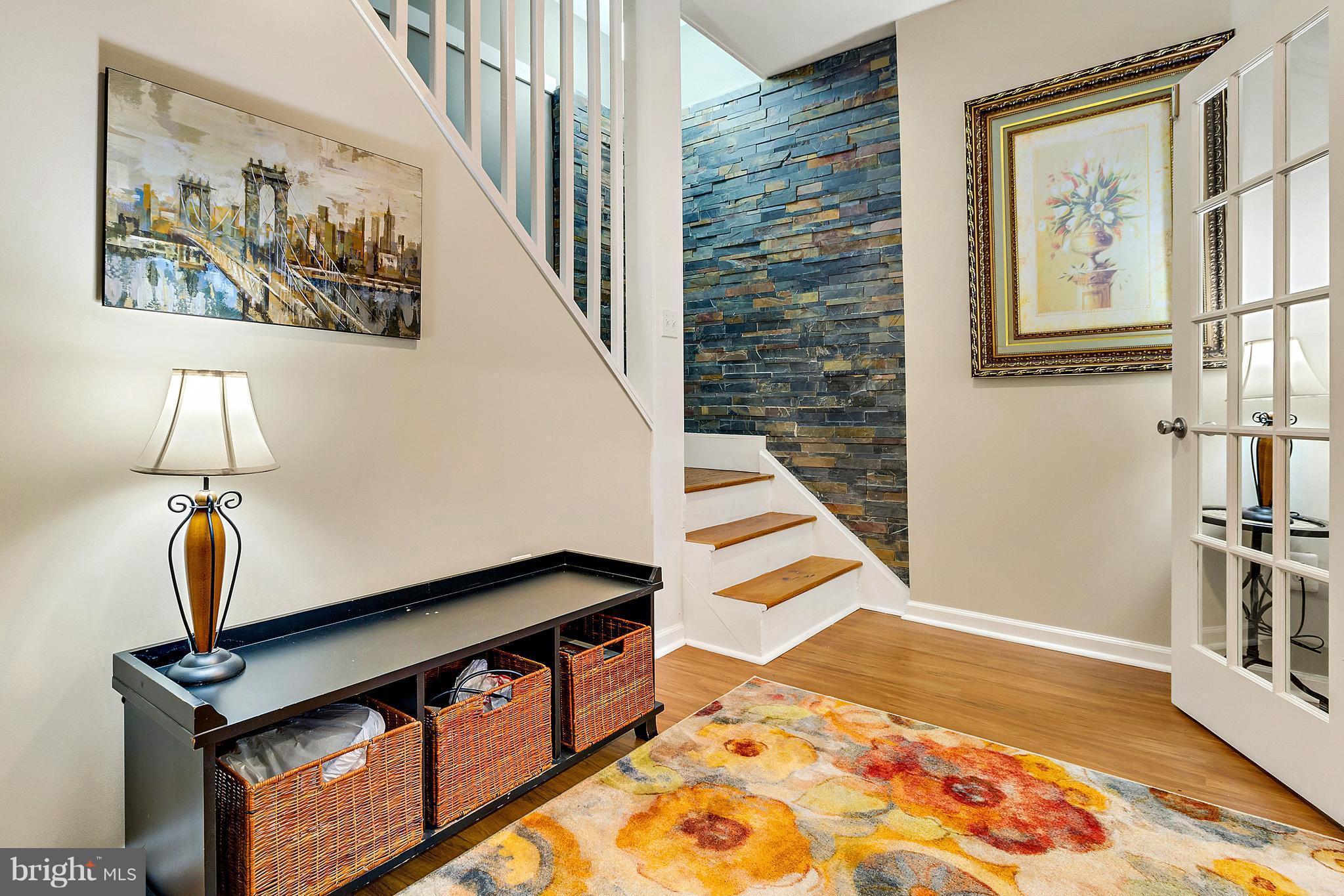 8040 Stillbrooke Road Manassas, VA 20112 - Photo 25 of 29 Lower Level Entry w/French Doors Stone Accent Wall